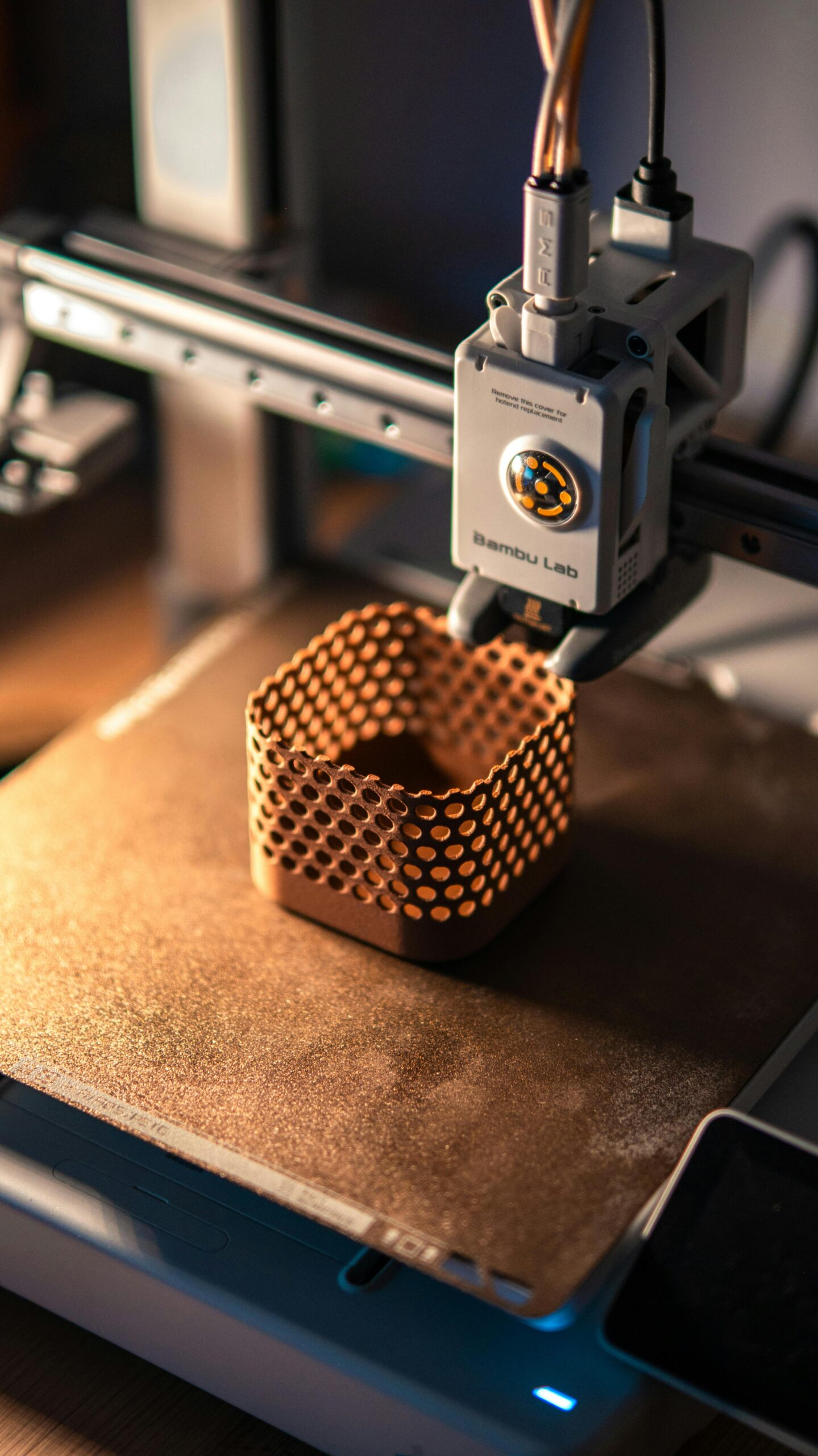 Filament-based 3D printer producing a functional prototype using FDM additive manufacturing technology.